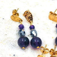 Boucles améthyste et thérahertz (acier doré)