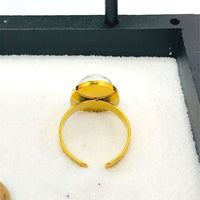 BAGUE REGLABLE PIERRE NATURELLE OVALE FACETTEE Acier doré